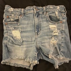 American Eagle Medium Wash High Rise Ripped Shorts.